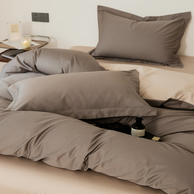 Parure de lit quatre pièces en laine et coton