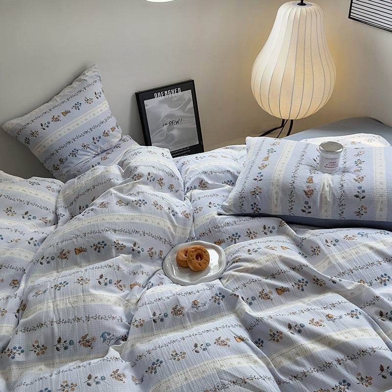 Parure de lit quatre pièces en coton lavé