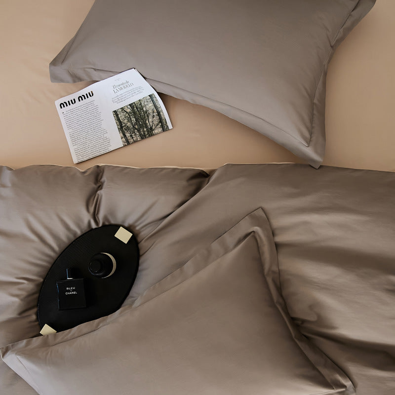 Parure de lit quatre pièces en laine et coton