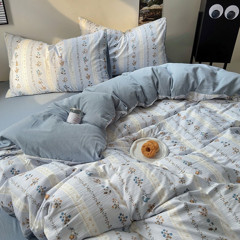 Parure de lit quatre pièces en coton lavé 